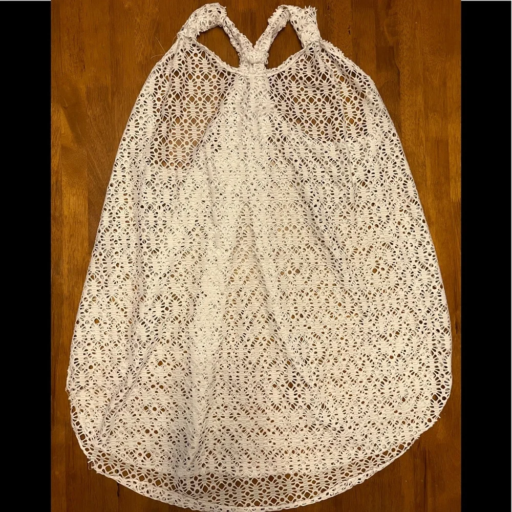EUC swim coverup with adjustable straps and back. Excellent condition.